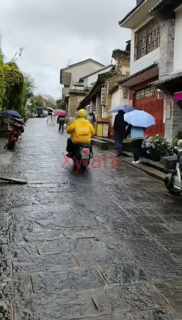 Delivery guy on the stone road
